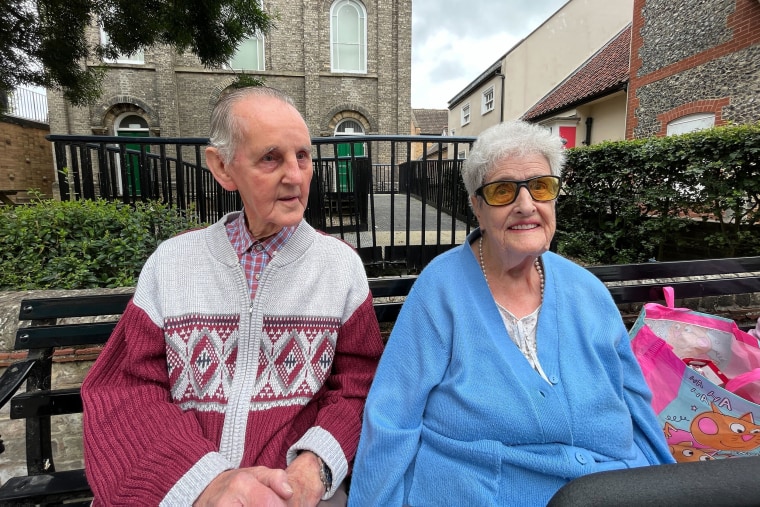 Glenis Stevenson, 90, left, was a long-time Conservative voter but switched his vote to Labour Thursday, becoming part of the sweeping national swing to the center-left party.