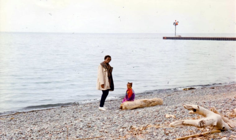 Old photograph of Zinhle as a child with her mom.