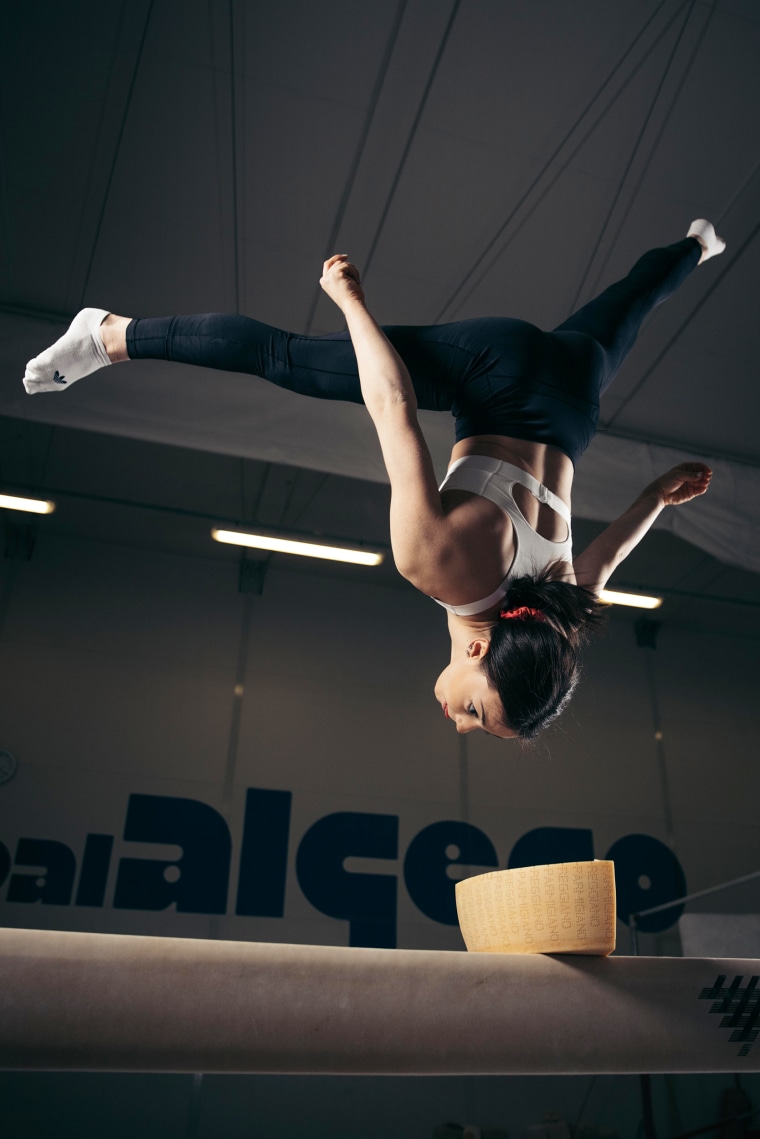 Giorgia Villa flipping over Parmigiano Reggiano.