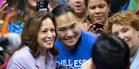 Kamala Harris poses for photos with supporters 