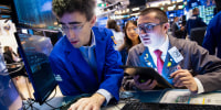 Traders working at the New York Stock Exchange on October 2, 2024.