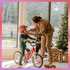 Two kids riding on bikes