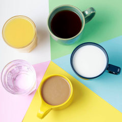 Coffee tea and other drinks in colorful cups