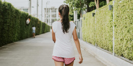 Walking for warming up around her apartment in an early morning-stock photo