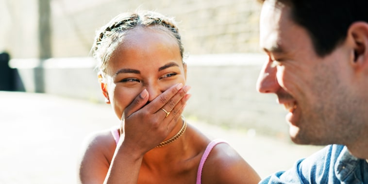 Two friends laughing