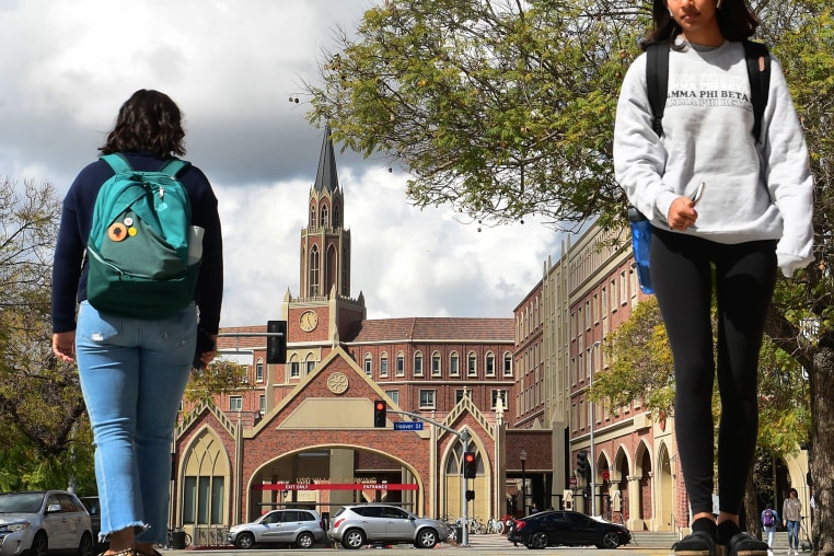 Image: Students walk on the campus at the University of Southern California in Los Angeles.