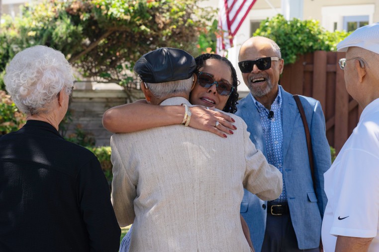 The Dongs welcome the Thompsons’ great-grandchildren back to the home where their lives intersected.