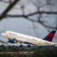 A Delta Airlines plane departs Raleigh-Durham International Airport (RDU) in Morrisville, N.C., on Jan. 20, 2022.