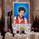 A tapestry featuring a portrait of Carlo Acutis hangs at the St. Francis Basilica during his beatification ceremony on Oct. 10, 2020 in Assisi, Italy. 