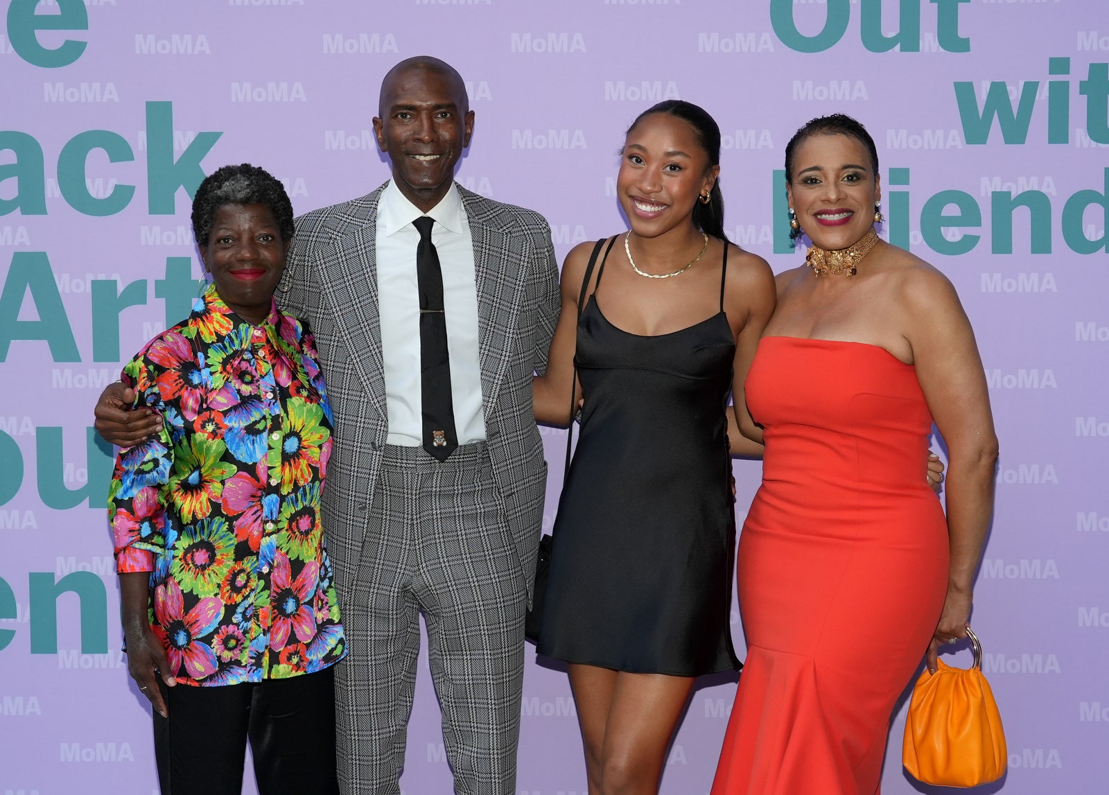 From left Thelma Golden Elliot Perry Morgan Perry Kim Perry posing for a photo together at MoMAs Black Arts Council benefit