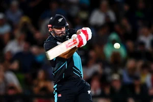John Davidson/Photosport via AP : New Zealand's Daryl Mitchell bats against Pakistan during their 4th T20I match in Christchurch