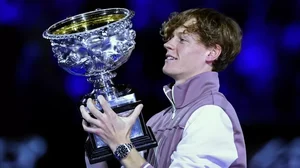 AP : Jannik Sinner of Italy holds aloft the trophy after winning the Australian Open 2024 mens singles 
