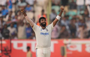 AP : Jasprit Bumrah celebrates after picking up the wicket of James Anderson on the second day of the second Test match between India and England in Visakhapatnam.