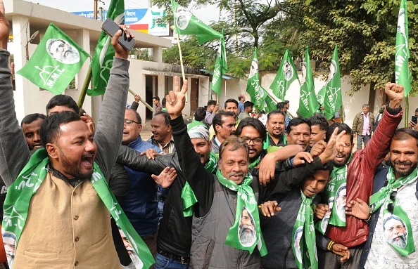 JMM workers celebrate after the Jharkhand assembly election results at state party headquarters on December 23, 2019 in Ranchi. - Getty Images