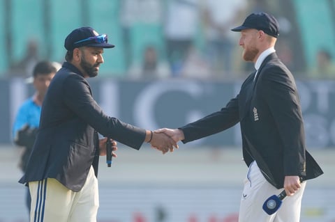 India's captain Rohit Sharma, left, and England's captain Ben Stokes at the toss ahead of the third Test in Rajkot on February 15, 2024.