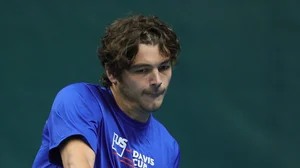 X/ @usta : USA's Taylor Fritz in action during Davis Cup 2024