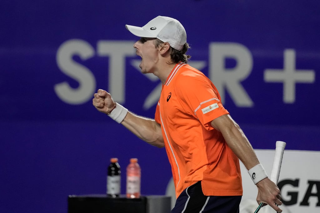 Alex de Minaur celebrates after defeating Stefanos Tsitsipas during their Mexican Open quarter-final match in Acapulco, Mexico.