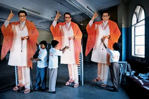 Photo: Outlook Archive : Presence of Absence:  Workers giving finishing touches to cut-outs of Bal Thackeray