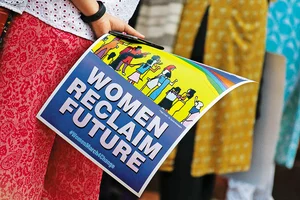 Photos: Getty Images : Raising Awareness: A woman holding a poster at a rally held in Mumbai to create awareness among voters, and demand social justice and equality for all
