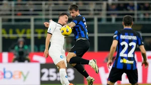 AP : Napoli's Giacomo Raspadori, left, vie for the ball with Inter Milan's Francesco Acerbi during their Serie A match at the San Siro Stadium in Milan, Italy on March 17, 2024.