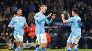 Nick Potts/PA via AP : Erling Haaland, centre, celebrates after scoring Manchester City's third goal during their UEFA Champions League round of 16 clash against Copenhagen.