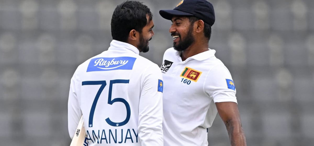 X/@ICC : Kamindu Mendis and skipper Dhananjaya de Silva (R) during their partnership.