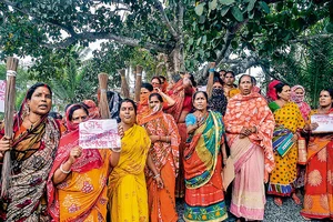 Photo: PTI : No More: Women staging a protest in Sandeshkhali
