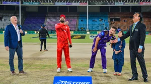 Photo: X/ @thePSLt20 : Islamabad United captain Shadab Khan (L) with the coin at the toss time along with Quetta Gladiators captain Rilee Rossow for the Eliminator 1 match in PSL 2024.