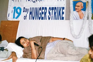 Photo: Getty Image : A Mass Leader (Top) Mamata Banerjee during her Singur hunger strike, Mamata walking with Nandigram victims in Delhi 