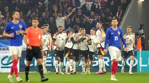 AP : Florian Wirtz, centre, celebrates his goal for Germany against France in the international friendly on Sunday (March 24, 2024).