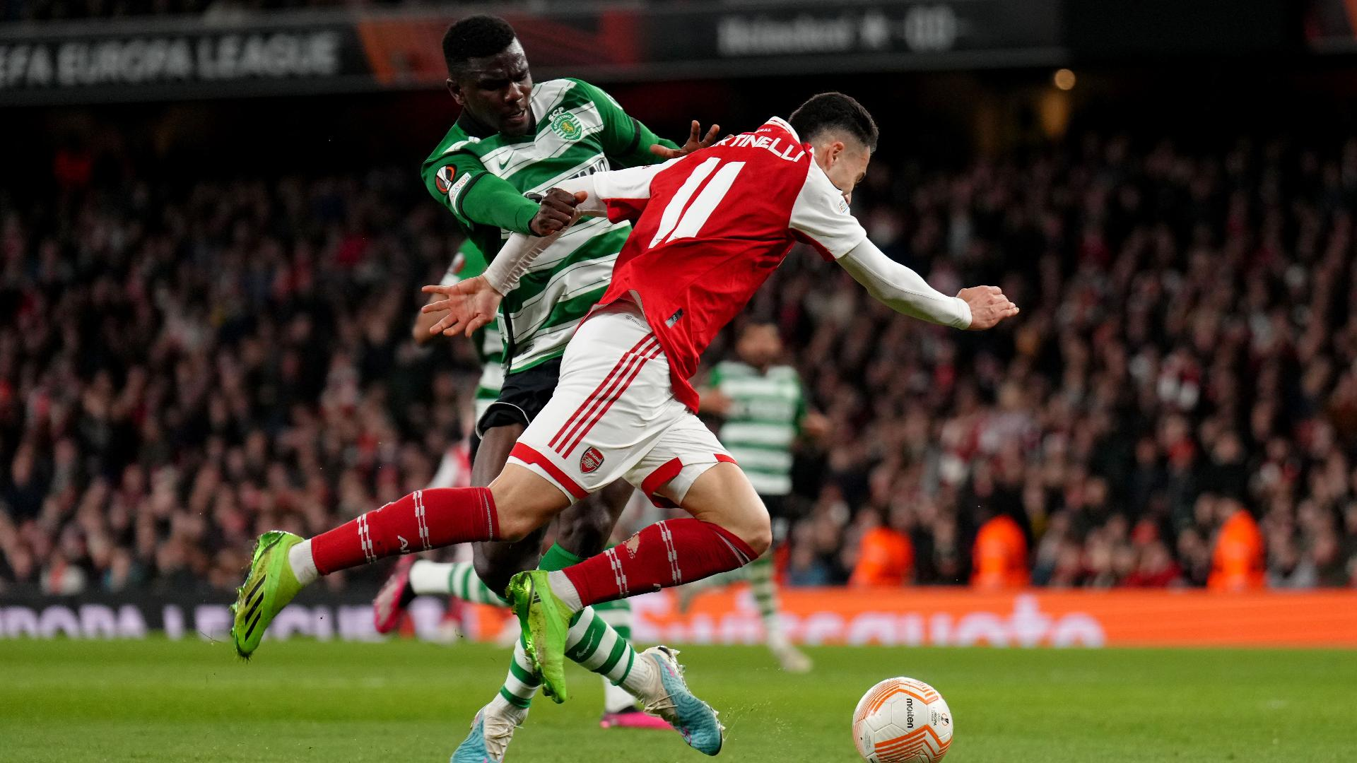 John Walton/PA : Arsenal’s Gabriel Martinelli (right) and Sporting’s Ousmane Diomande battle for the ball.