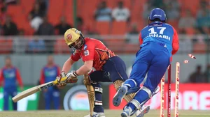 AP Photo/Pankaj Nangia : Delhi Capitals' captain Rishabh Pant, right, attempts to stump out Punjab Kings' Jitesh Sharma during the Indian Premier League cricket tournament match between Delhi Capitals and Punjab Kings in Mullanpur.