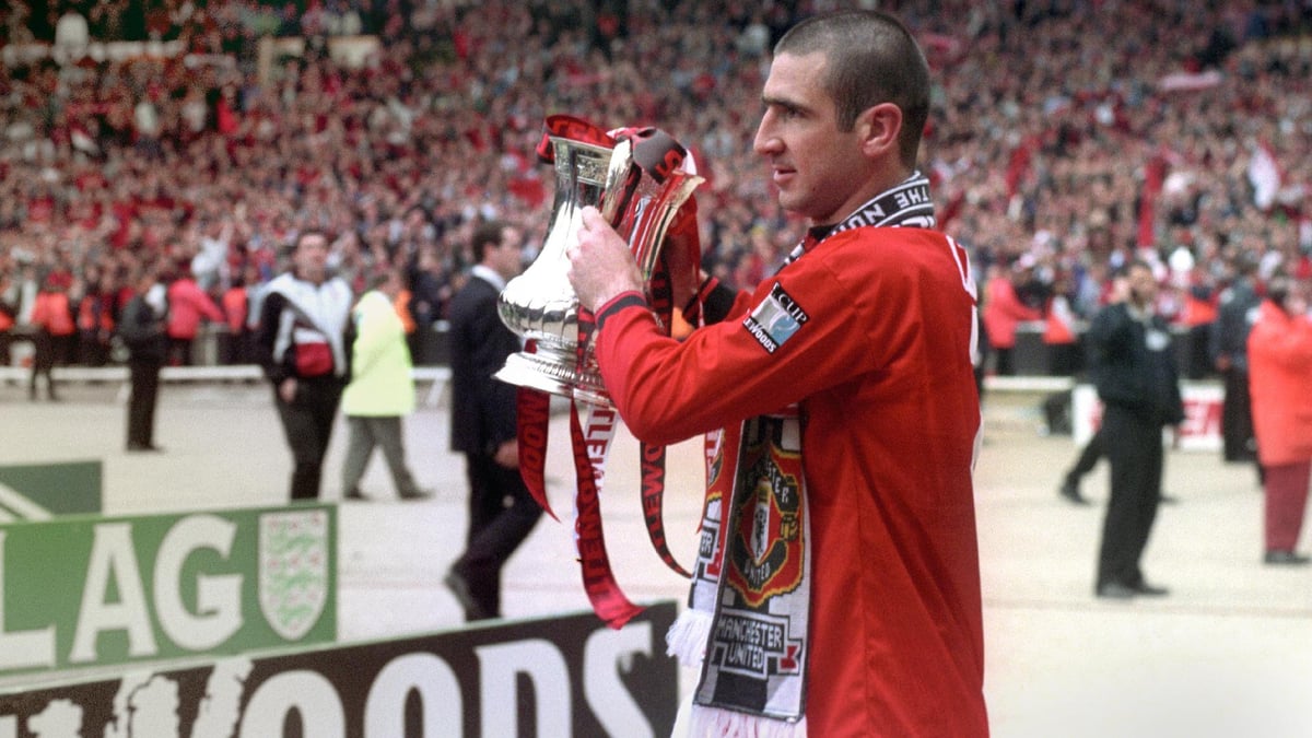 PA : Eric Cantona, lifting the FA Cup, won the competition twice and four Premier League titles with United.