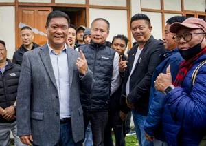 PTI : Arunachal Pradesh Chief Minister Pema Khandu shows his finger marked with indelible ink after casting his vote for the first phase of Lok Sabha elections, in Tawang district, Friday, April 19, 2024
