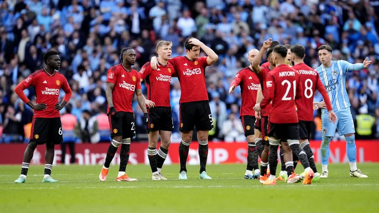 Manchester United players during the FA Cup semi-final penalty shootout. - Nick Potts/PA