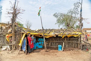 Photos: Sumit Dayal : Reality Bites: A mud house barely covered with dried leaves and bamboo at Saikheda village