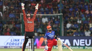 AP Photo/Kashif Masood : Royal Challengers Bengaluru's Virat Kohli reacts after being bowled out during the Indian Premier League cricket match between Royal Challengers Bengaluru and Sunrisers Hyderabad in Bengaluru.