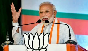 PTI : PM Narendra Modi addressing a public meeting |