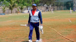 Special arrangement : File photo of Jwala Singh, childhood coach of rising Indian cricket star Yashasvi Jaiswal, at a nets practice session in Mumbai.