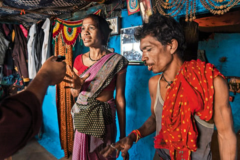 Rani Inwati and her husband inside their mud house in Saikheda village