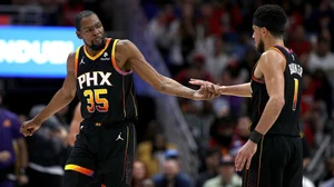 AP : Kevin Durant (left) and Devin Booker of the Phoenix Suns 