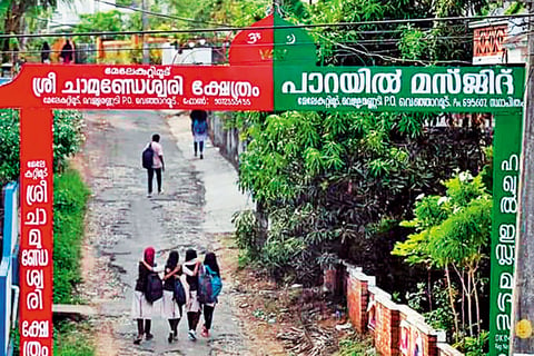 Joining Hands: The Chamundidevi temple and the Parayil Masjid in Venjaramoodu, Thiruvananthapuram, share the same board 
at the entrance