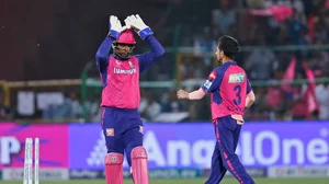 AP/Surjeet Yadav : Rajasthan Royals' captain Sanju Samson, left, congratulates teammate Yuzvendra Chahal for taking the wicket of Gujarat Titans' captain Shubman Gill during the Indian Premier League 2024 match in Jaipur on Wednesday (April 10).