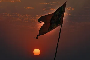Photo: Tribhuvan Tiwari : Change in the Air: An Angry Hanuman flag fluttering at Dashashwamedh Ghat in Varanasi