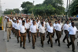 Photo by Sunny Shende via Getty Images : RSS workers take part in a foot march (Pathsanchalan) on the occasion of Vijay Dashmi Utsav celebration, on October 18, 2018 in Nagpur, India.