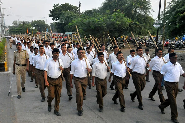 RSS workers take part in a foot march (Pathsanchalan) on the occasion of Vijay Dashmi Utsav celebration, on October 18, 2018 in Nagpur, India. - Photo by Sunny Shende via Getty Images