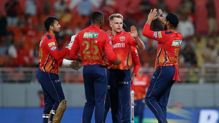 Punjab Kings' Sam Curran, second from right, celebrates the dismissal of Gujarat Titans' Sai Sudharsan during the Indian Premier League 2024 match in Mullanpur on April 21. - AP