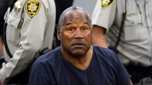 AP : File photo of former American football superstar OJ Simpson attending a criminal hearing in Clark County District Court, Las Vegas in 2013. 
