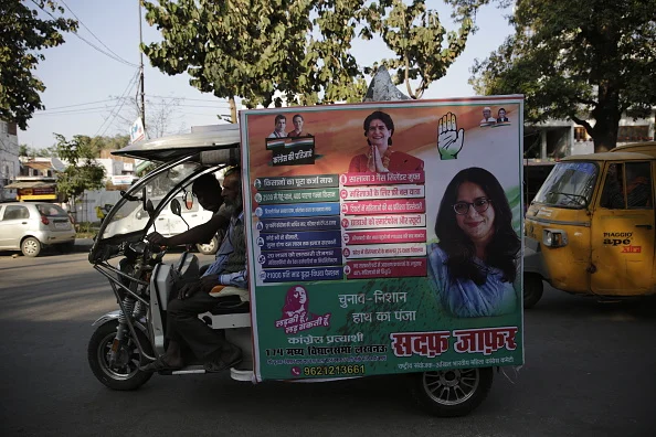 An election campaign billboard on a rickshaw in Lucknow, Uttar Pradesh, India, on Saturday, Feb. 19, 2022 - Getty Images
