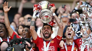 Bruno Fernandes lifts the FA Cup.